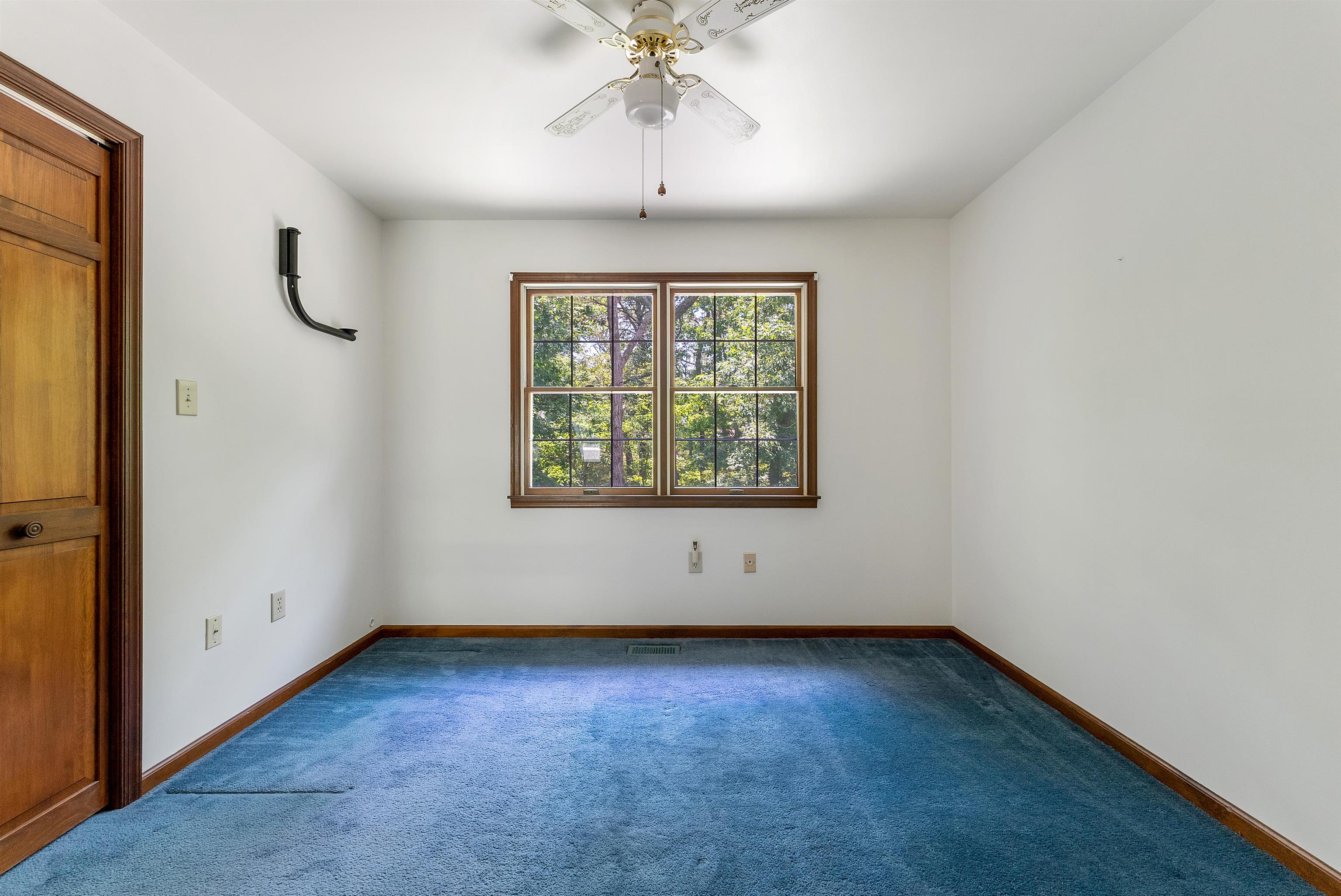 233 Fidler Road Dennisville, NJ 08270 - Photo 14 of 31 an empty room with a window and a ceiling fan