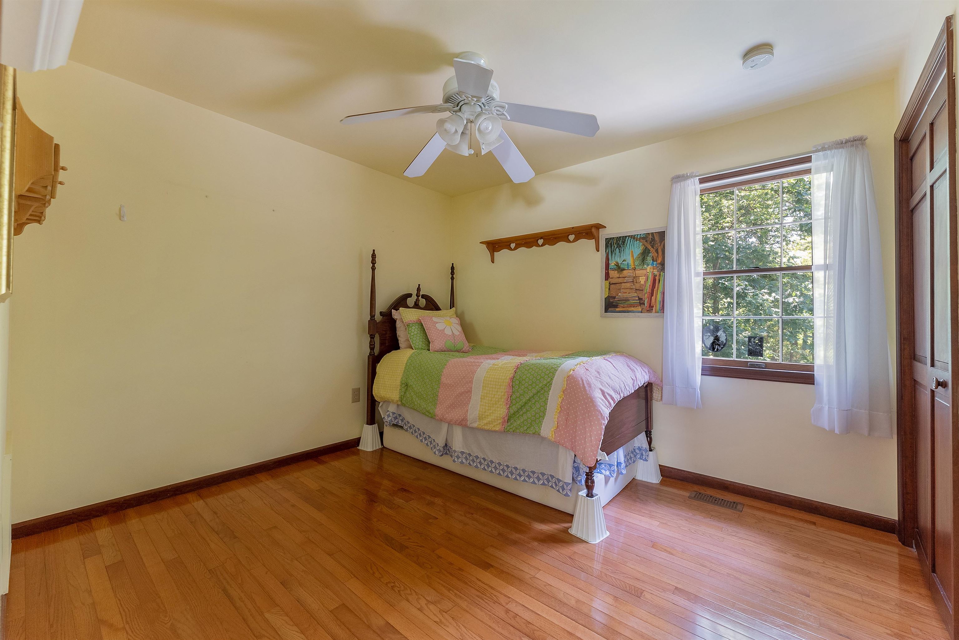 233 Fidler Road Dennisville, NJ 08270 - Photo 15 of 31 a bed sitting in a bedroom next to a window