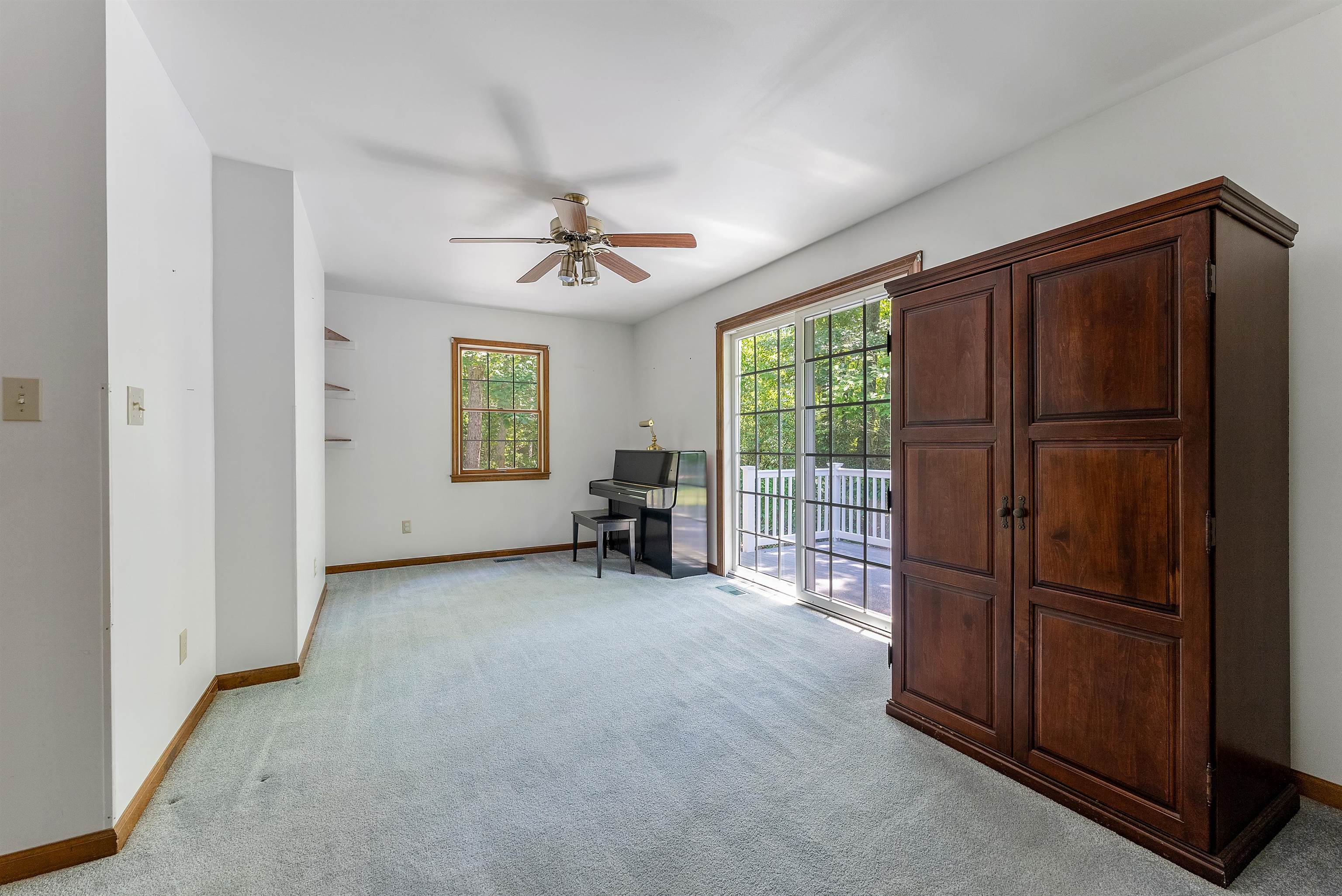 233 Fidler Road Dennisville, NJ 08270 - Photo 20 of 31 a view of a livingroom with furniture wooden floor and a ceiling fan