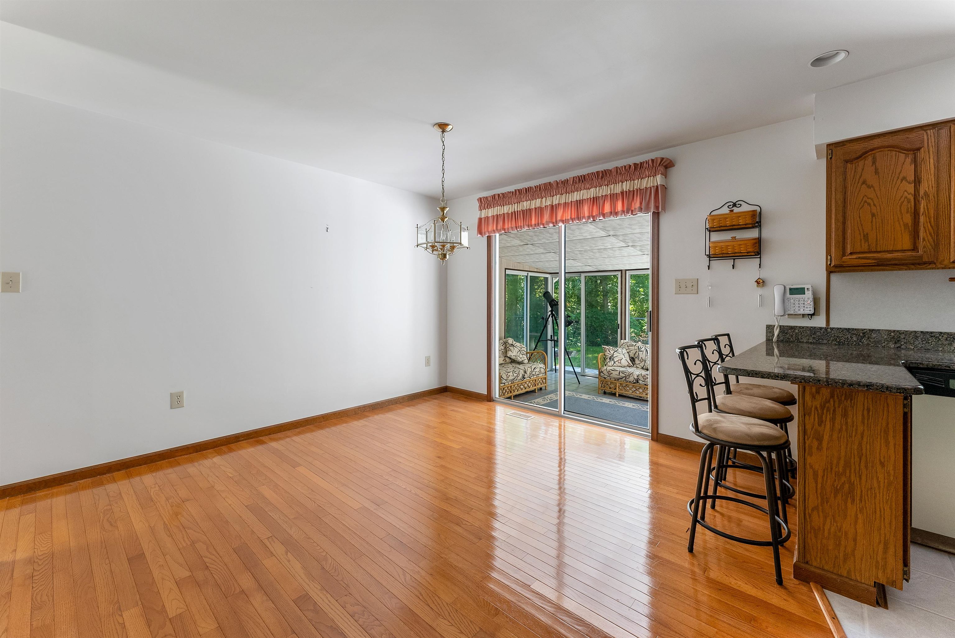 233 Fidler Road Dennisville, NJ 08270 - Photo 25 of 31 a view of an empty room with wooden floor and a window