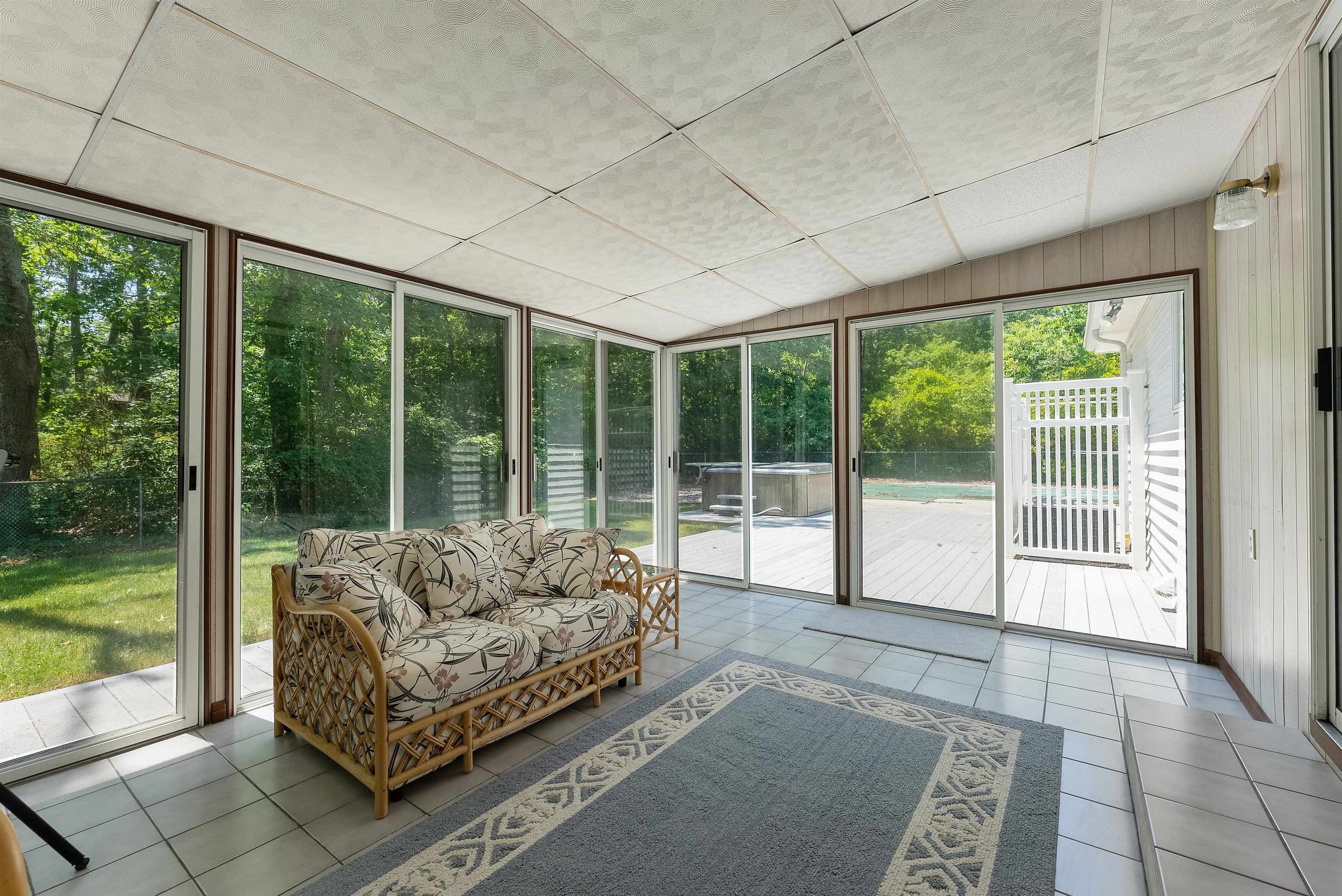 233 Fidler Road Dennisville, NJ 08270 - Photo 28 of 31 a living room with furniture and a floor to ceiling window