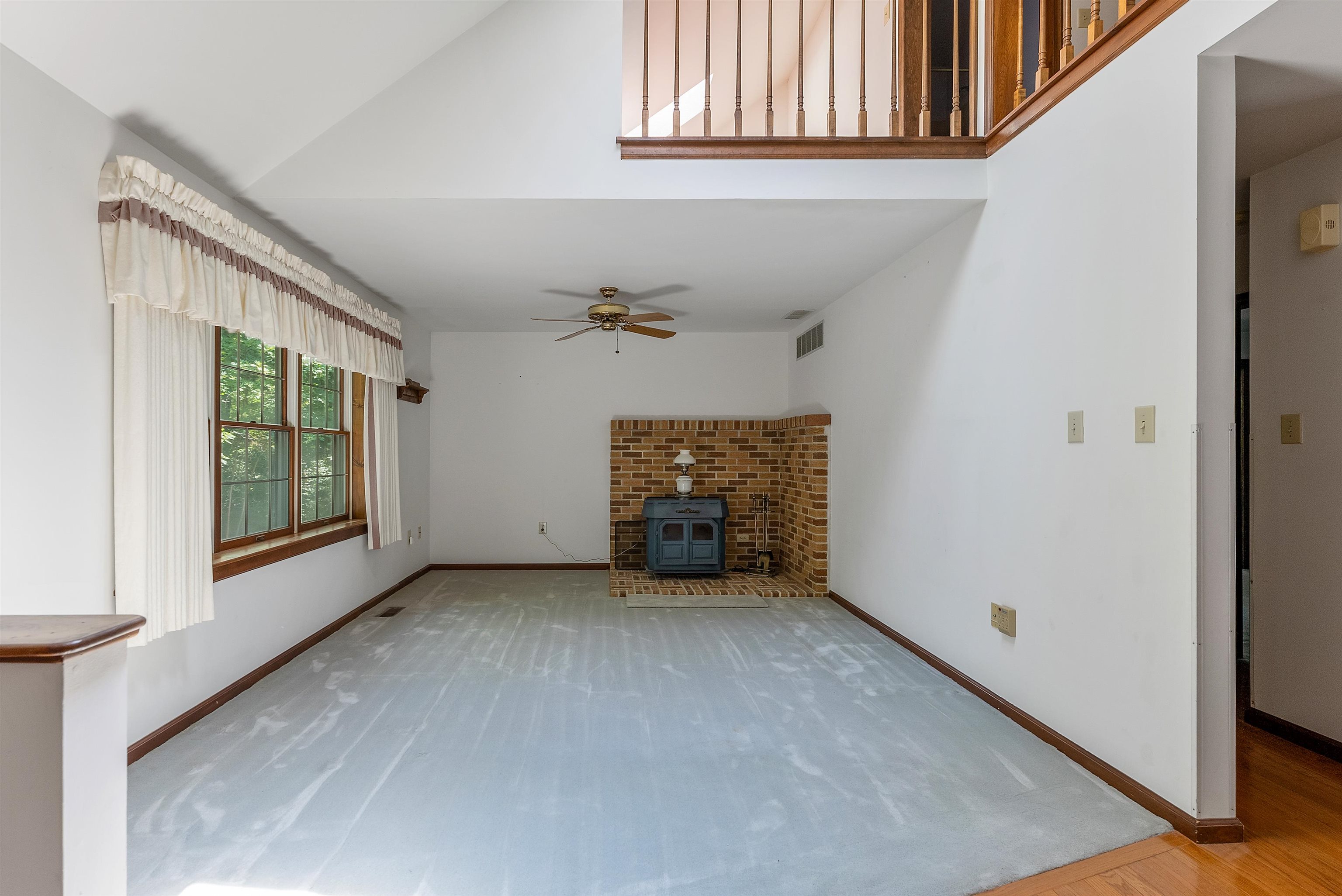 233 Fidler Road Dennisville, NJ 08270 - Photo 7 of 31 a view of a livingroom with an empty space and a window