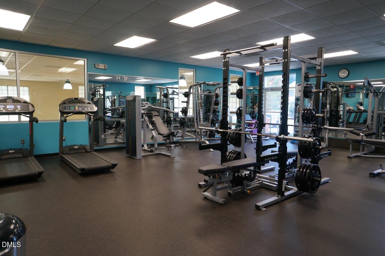 2444 Pumpkin Ridge Way Raleigh, NC 27604 - Photo 16 of 19 a view of a room with gym equipment