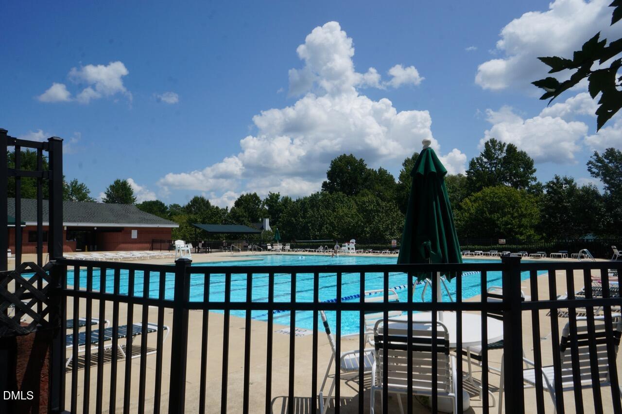 2444 Pumpkin Ridge Way Raleigh, NC 27604 - Photo 18 of 19 a view of a balcony with wooden fence