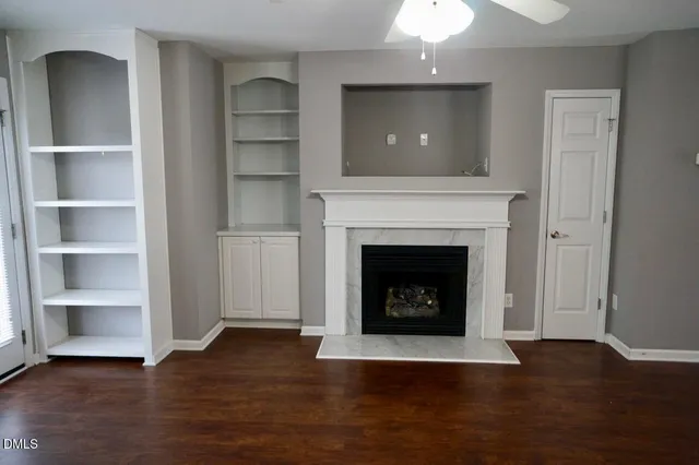 a living room with a fireplace
