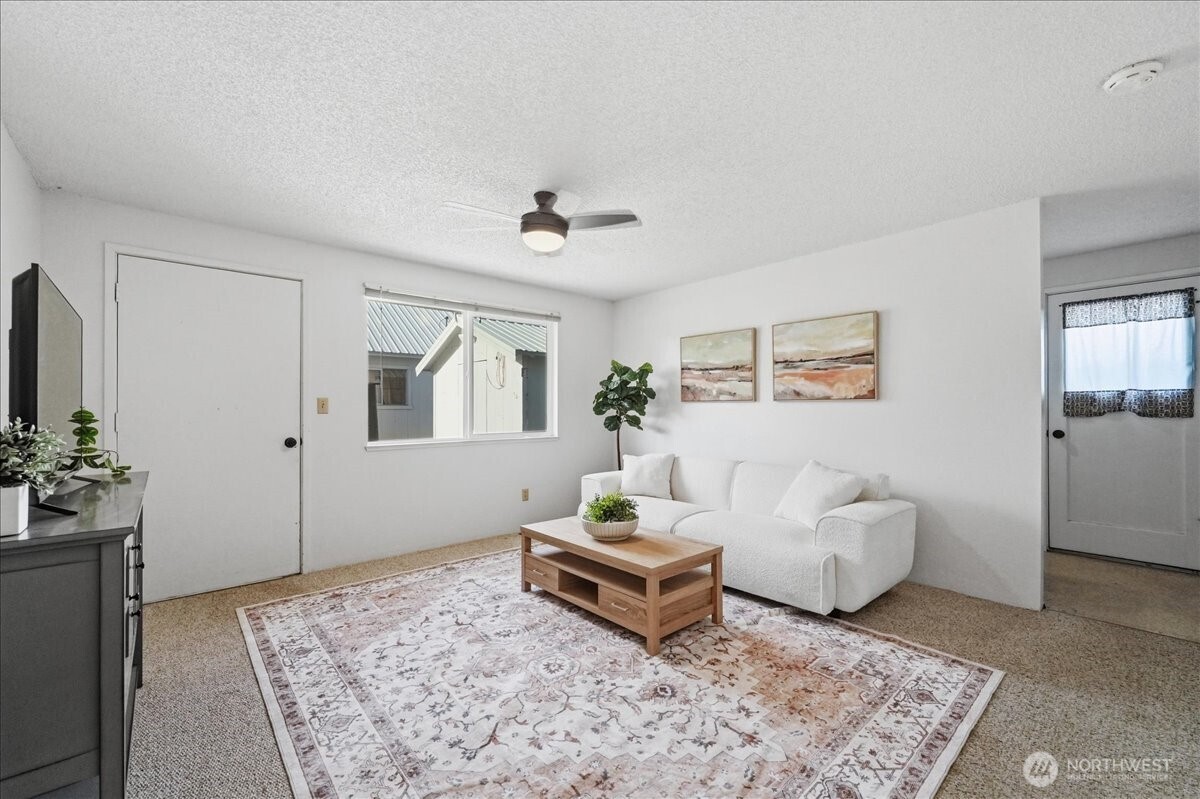 309 West Walnut Street Waterville, WA 98858 - Photo 14 of 28 a living room with furniture and wooden floor