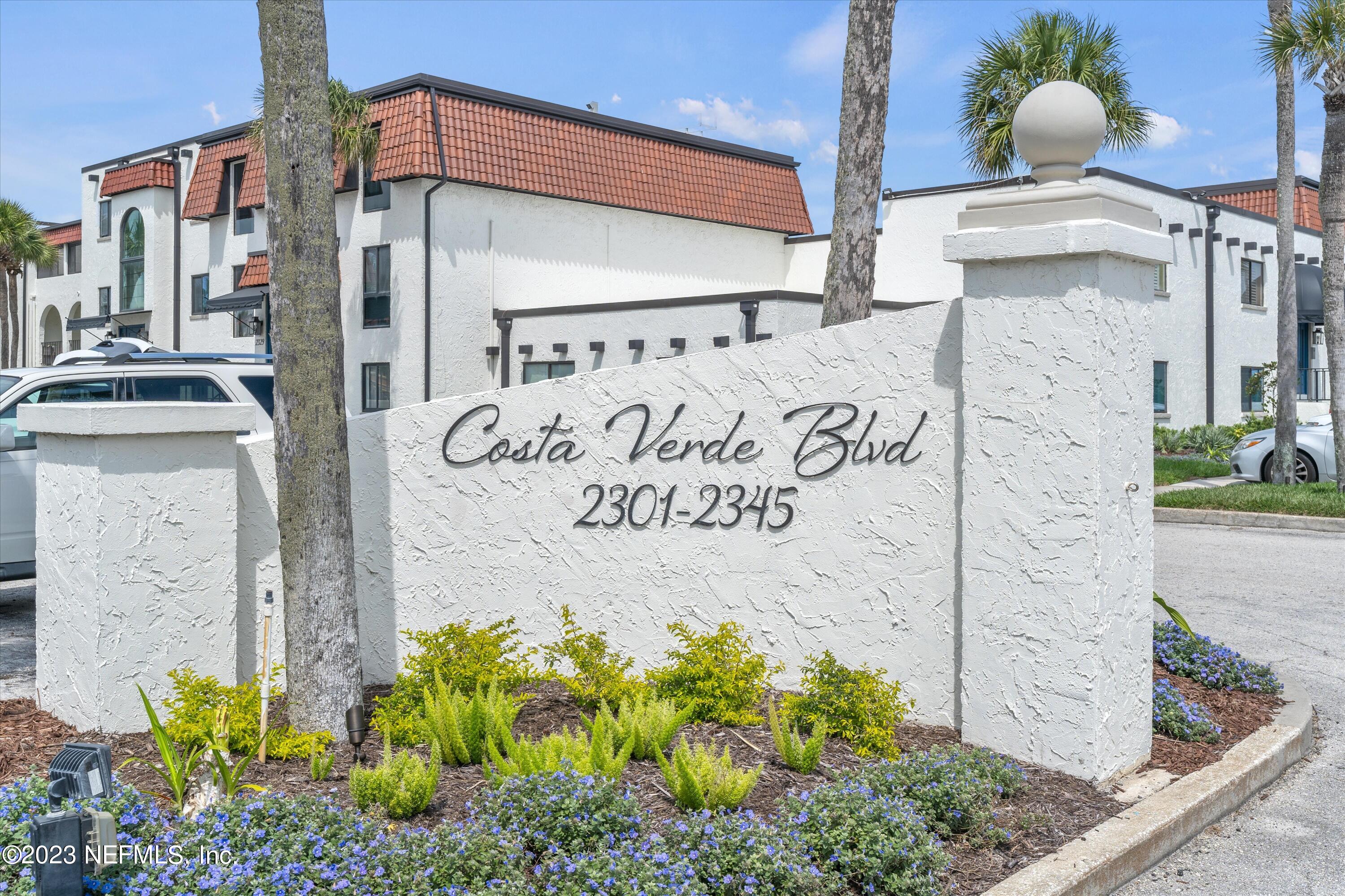 2323 Costa Verde Boulevard, Unit 202 Jacksonville Beach, FL 32250 - Photo 3 of 26 1-Front