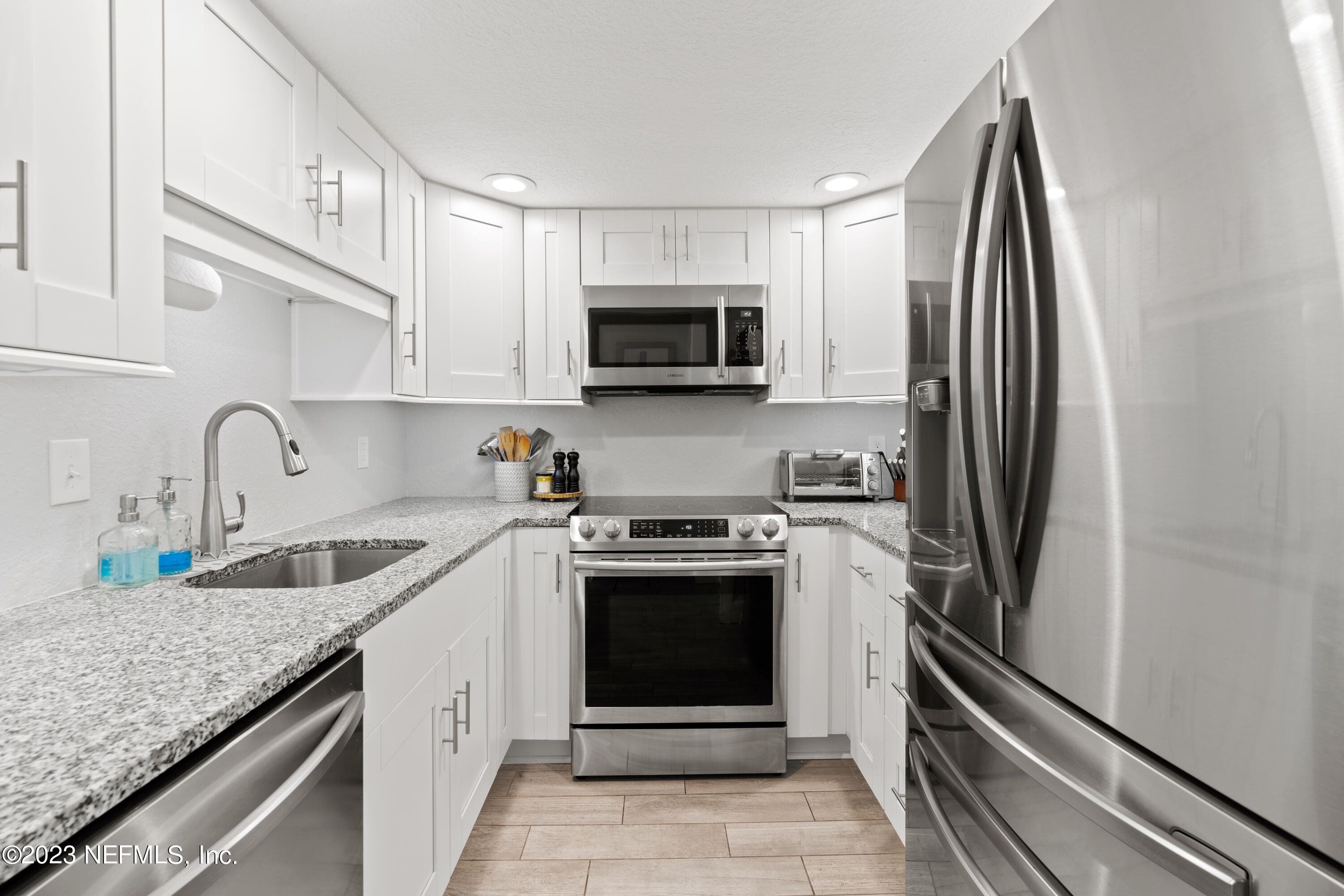 2323 Costa Verde Boulevard, Unit 202 Jacksonville Beach, FL 32250 - Photo 9 of 26 04-Kitchen