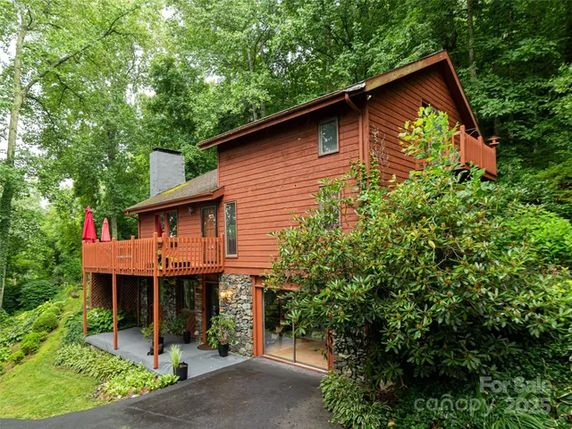 a house with trees in the background
