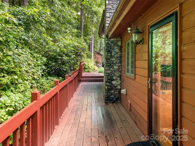 a view of balcony and yard