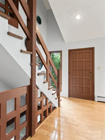 a view of an entryway with an empty room