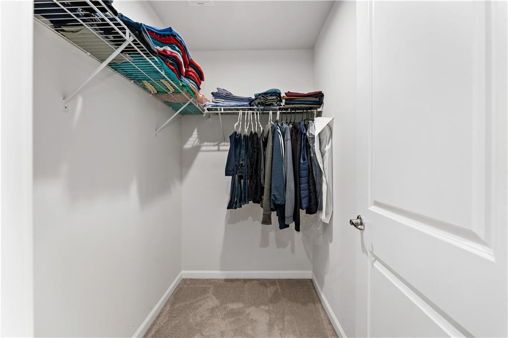 5103 Spruce Road Gibsonia, PA 15044 - Photo 19 of 50 a view of walk in closet with clothes