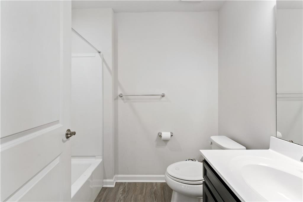 5103 Spruce Road Gibsonia, PA 15044 - Photo 33 of 50 a bathroom with a sink a toilet and shower