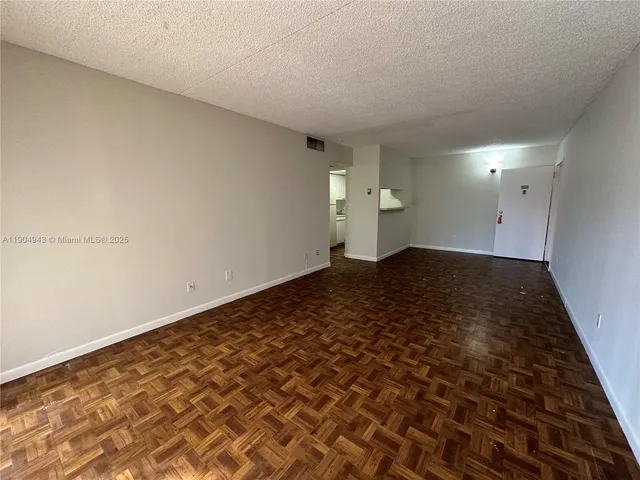 a big room with wooden floor