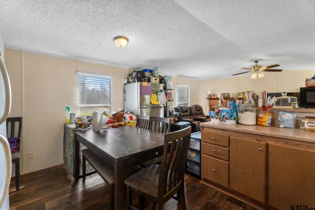 a view of a kitchen and dining room