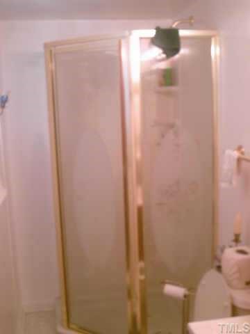209 Kennedy Street Raleigh, NC 27610 - Photo 8 of 8 a bathroom with a shower