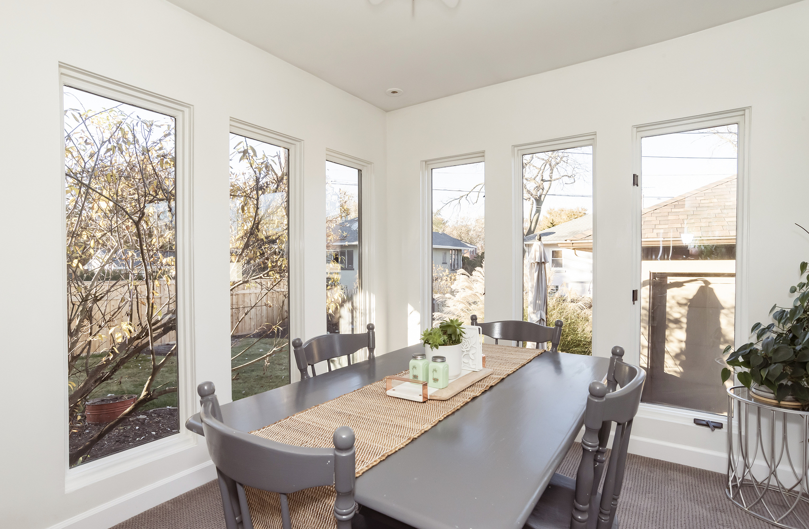 354 Robinson Court Riverside, IL 60546 - Photo 13 of 36 a view of a dining room with furniture window and wooden floor