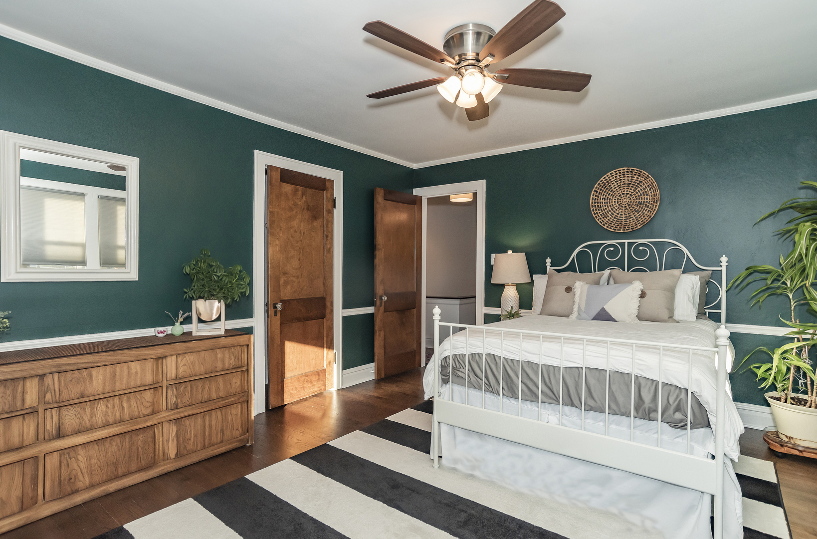 354 Robinson Court Riverside, IL 60546 - Photo 17 of 36 a bedroom with a bed and a table with chair