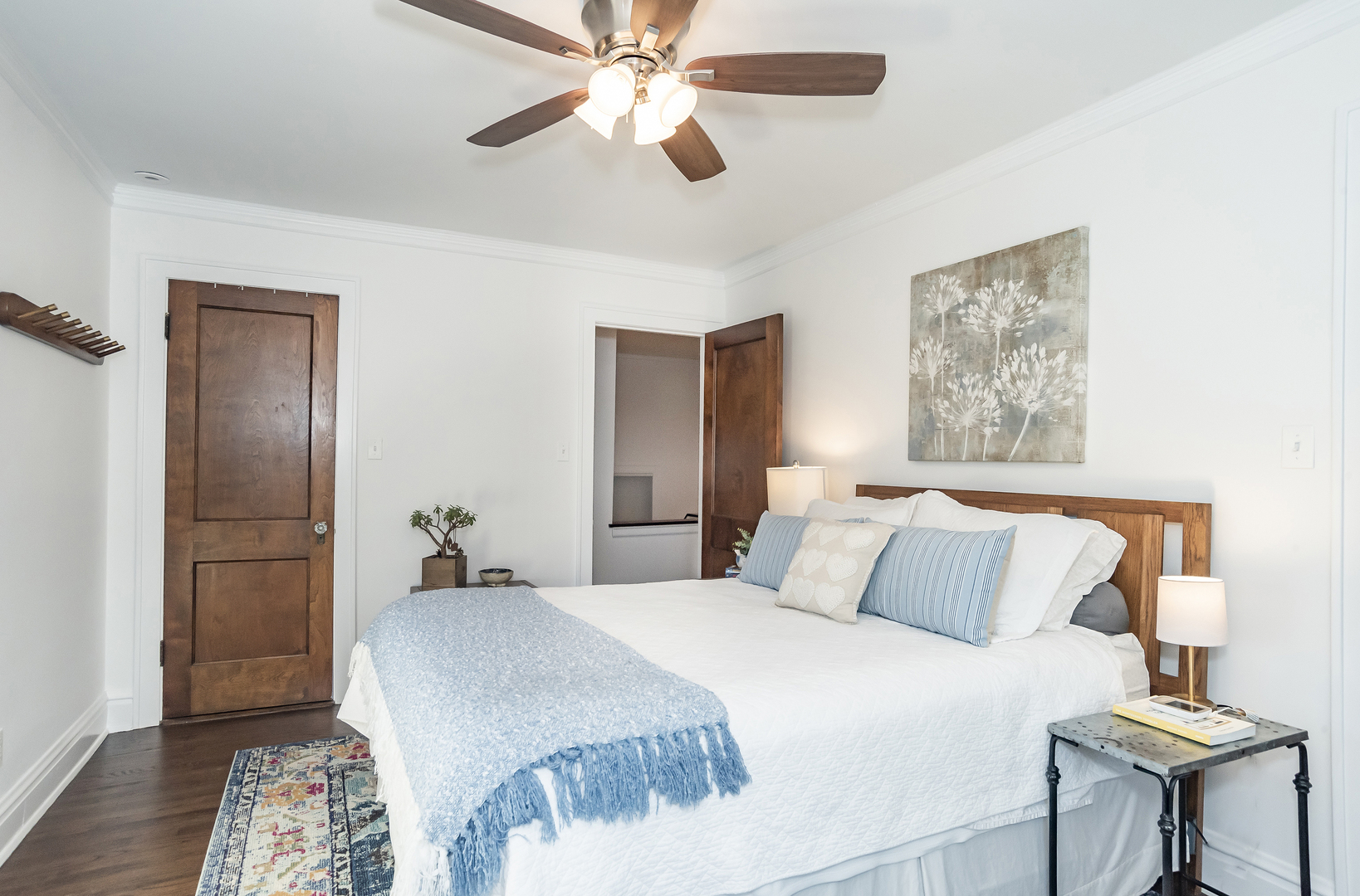 354 Robinson Court Riverside, IL 60546 - Photo 20 of 36 a bedroom with a bed and a chandelier