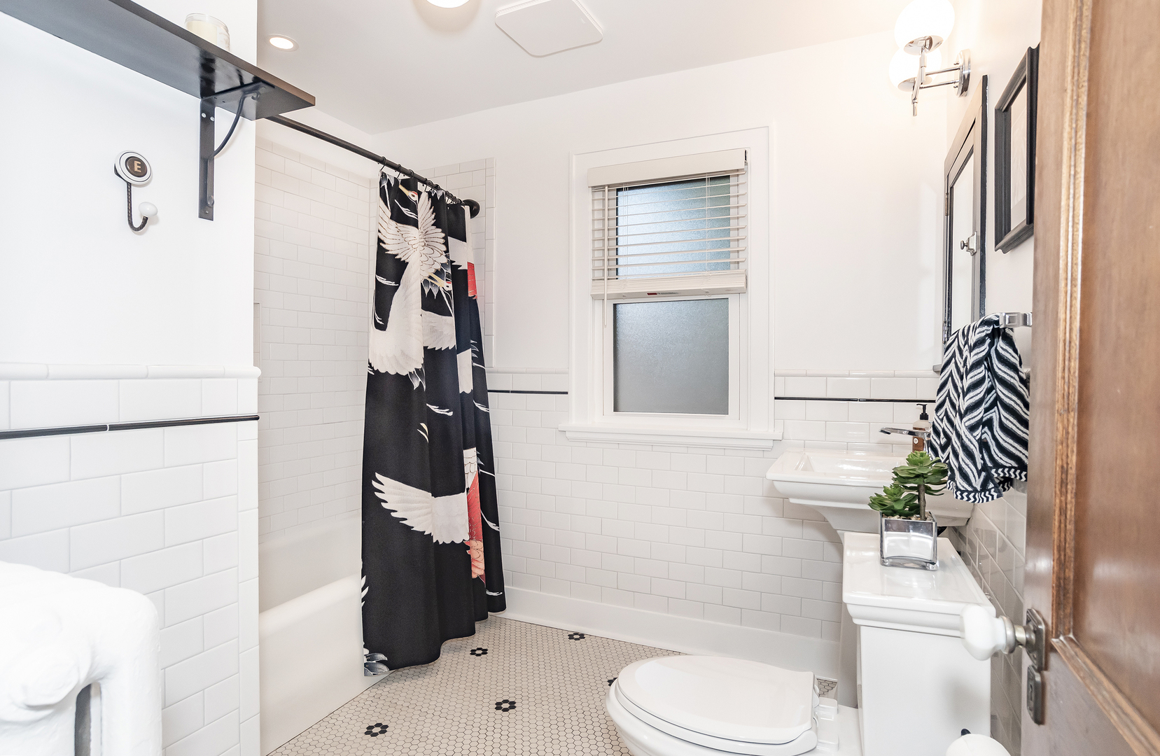 354 Robinson Court Riverside, IL 60546 - Photo 24 of 36 a bathroom with a toilet a sink and shower