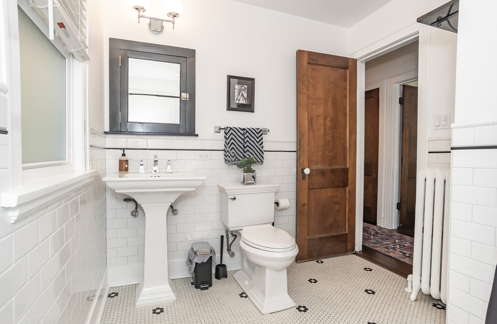 354 Robinson Court Riverside, IL 60546 - Photo 25 of 36 a bathroom with a sink toilet and shower