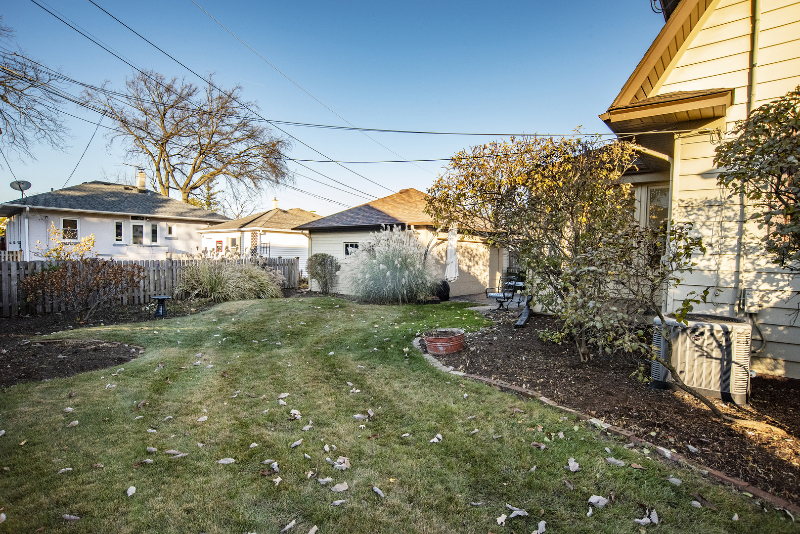 354 Robinson Court Riverside, IL 60546 - Photo 33 of 36 a view of a backyard with plants and large tree