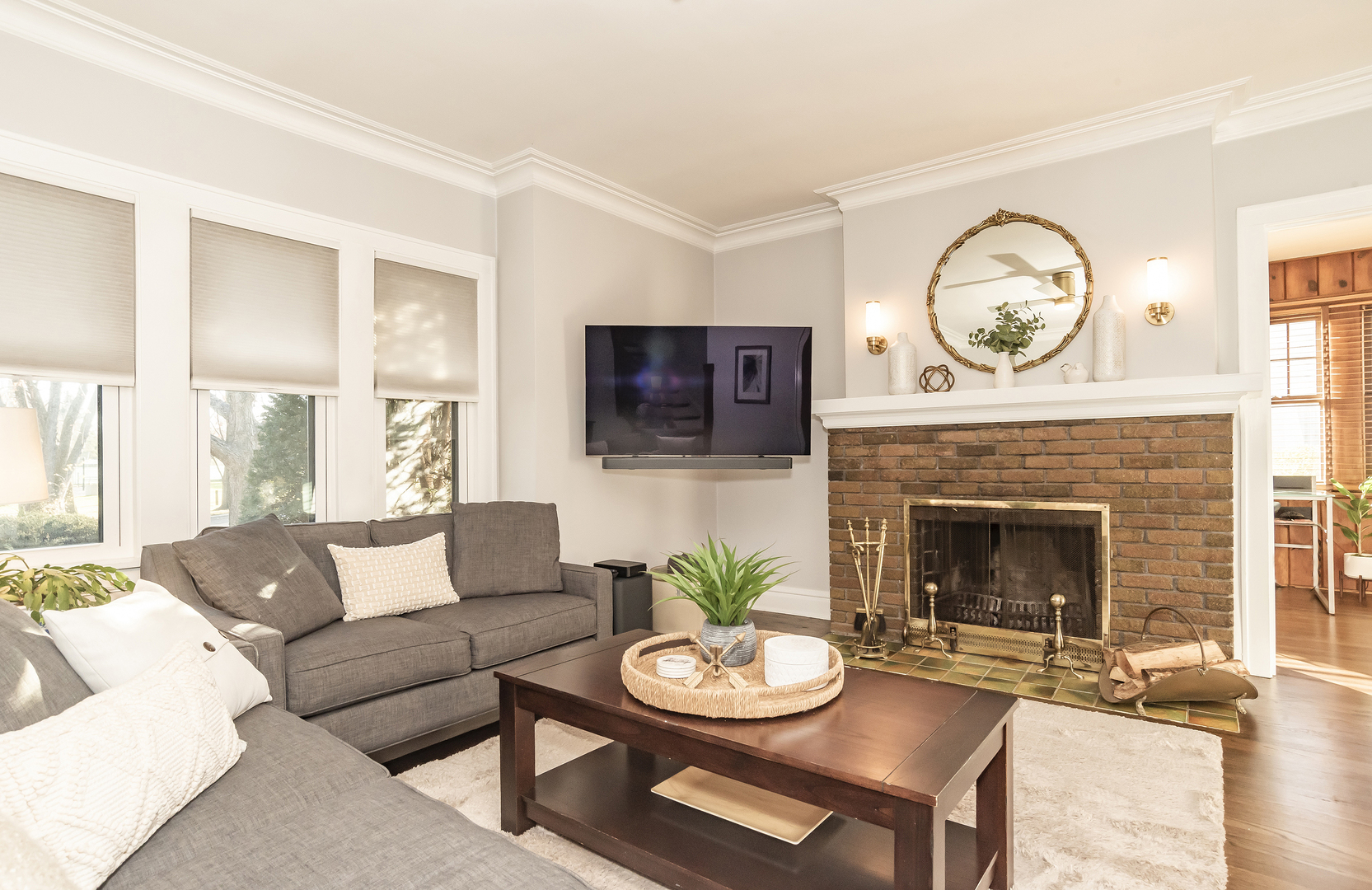 354 Robinson Court Riverside, IL 60546 - Photo 4 of 36 a living room with furniture a fireplace and a large window