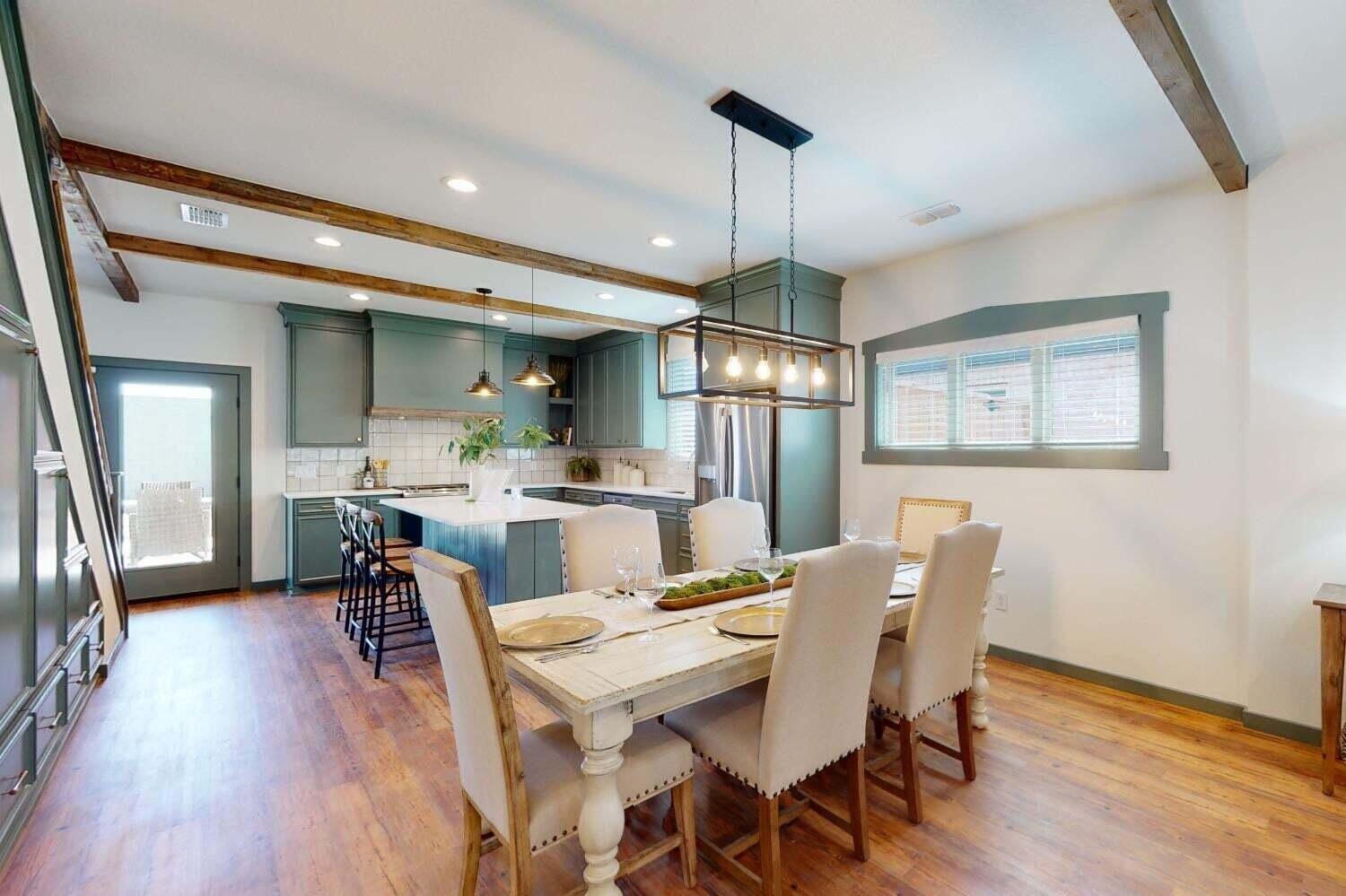 3617 128th Street Lubbock, TX 79423 - Photo 4 of 30 a view of a dining room with furniture window and wooden floor