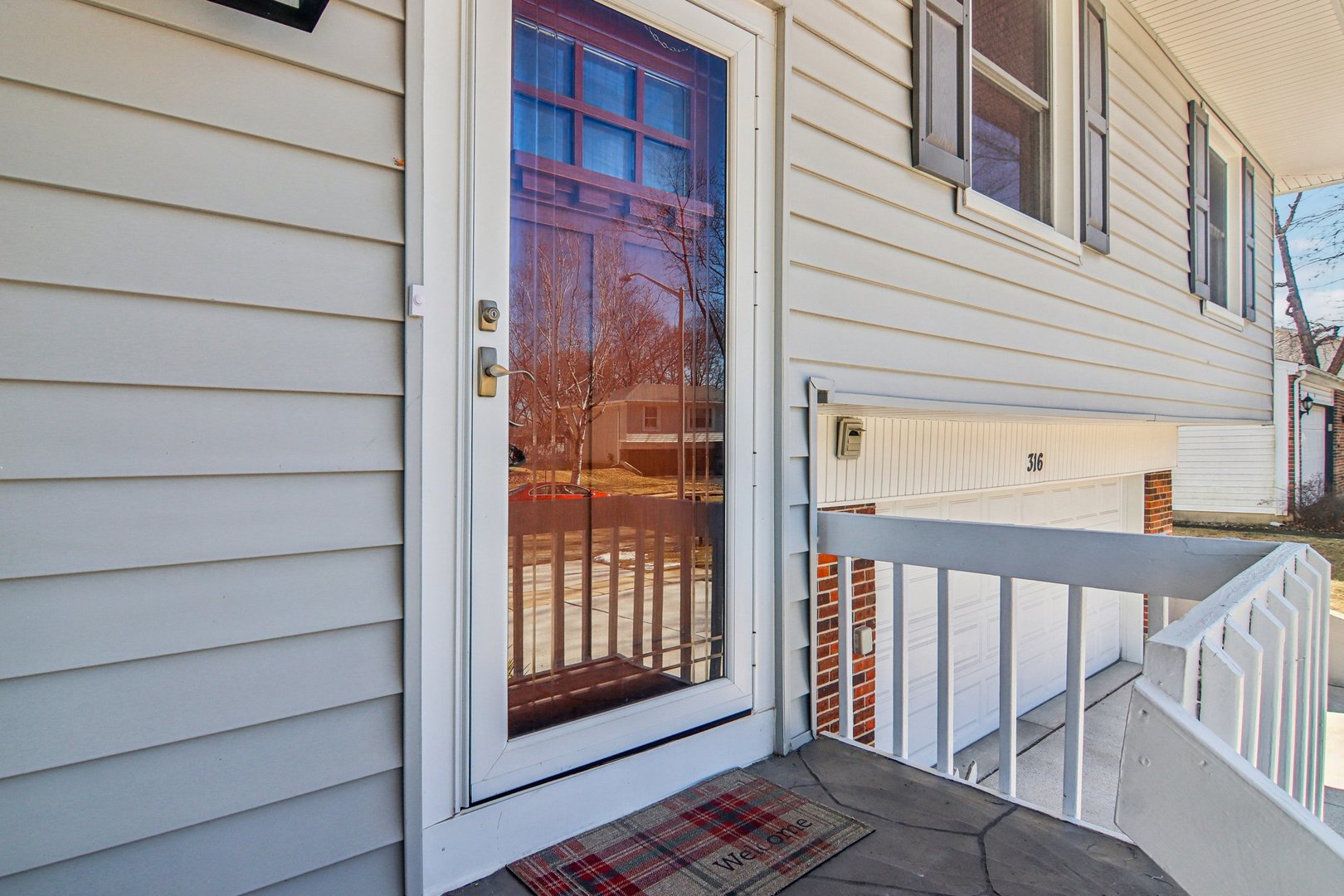 316 Bedford Road Bolingbrook, IL 60440 - Photo 4 of 38 a view of a balcony with a potted plant