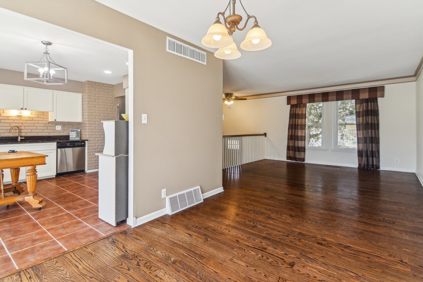 316 Bedford Road Bolingbrook, IL 60440 - Photo 8 of 38 wooden floor in an empty room with a stove