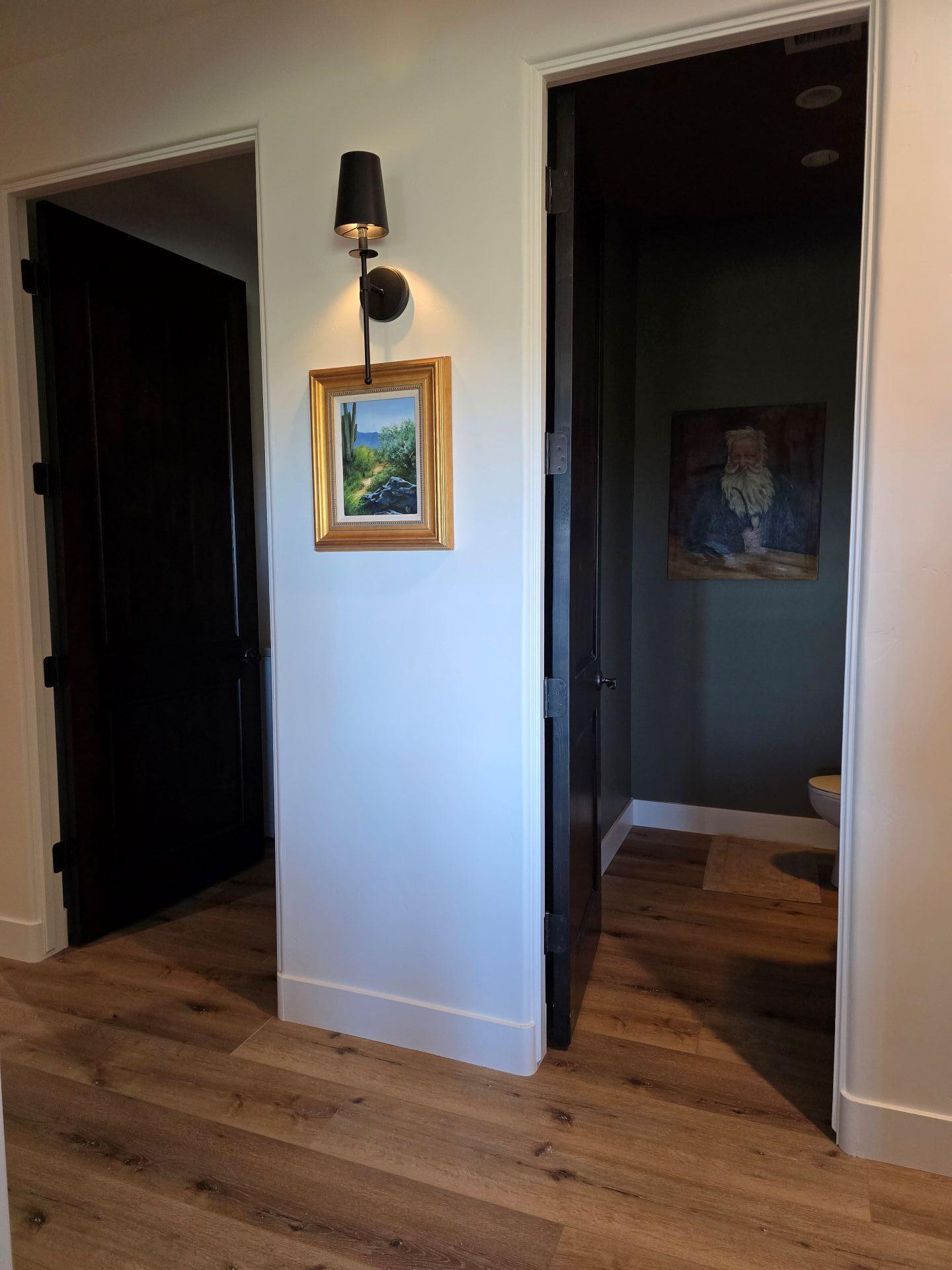 240 Rockinghorse Bend Road Payson, AZ 85541 - Photo 33 of 53 a view of a hallway with wooden floor and closet