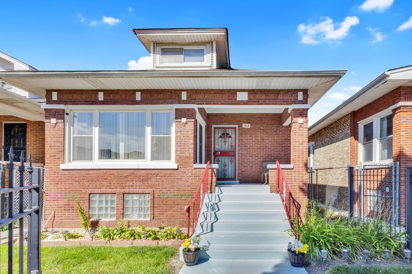 1418 North Mayfield Avenue Chicago, IL 60651 - Photo 1 of 28 a front view of a house