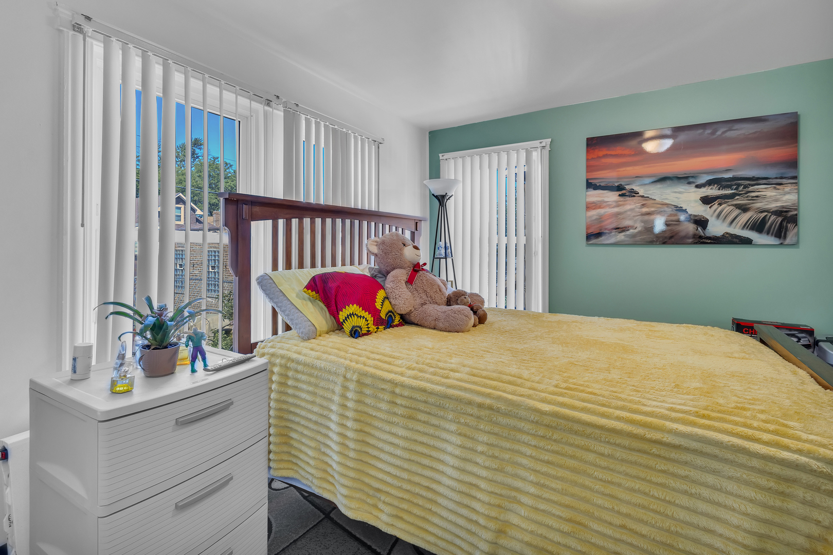 1418 North Mayfield Avenue Chicago, IL 60651 - Photo 12 of 28 a bedroom with a bed and furniture