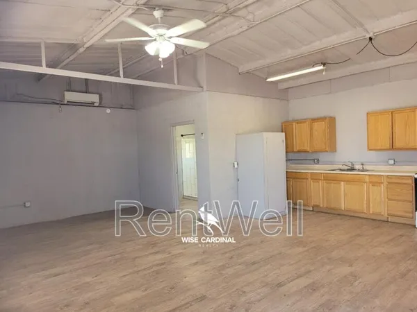 a view of a kitchen with a sink