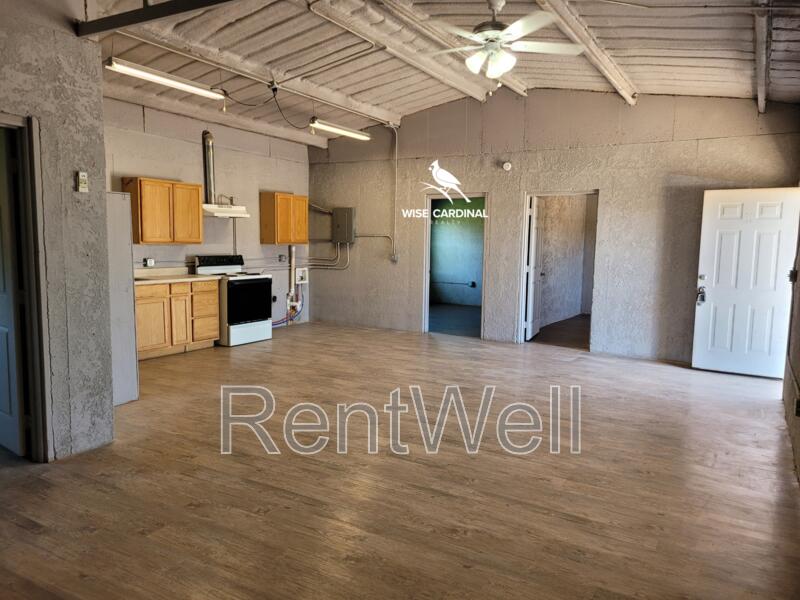 2709 County Road 7700 Lubbock, TX 79423 - Photo 25 of 29 a view of a hallway with a kitchen