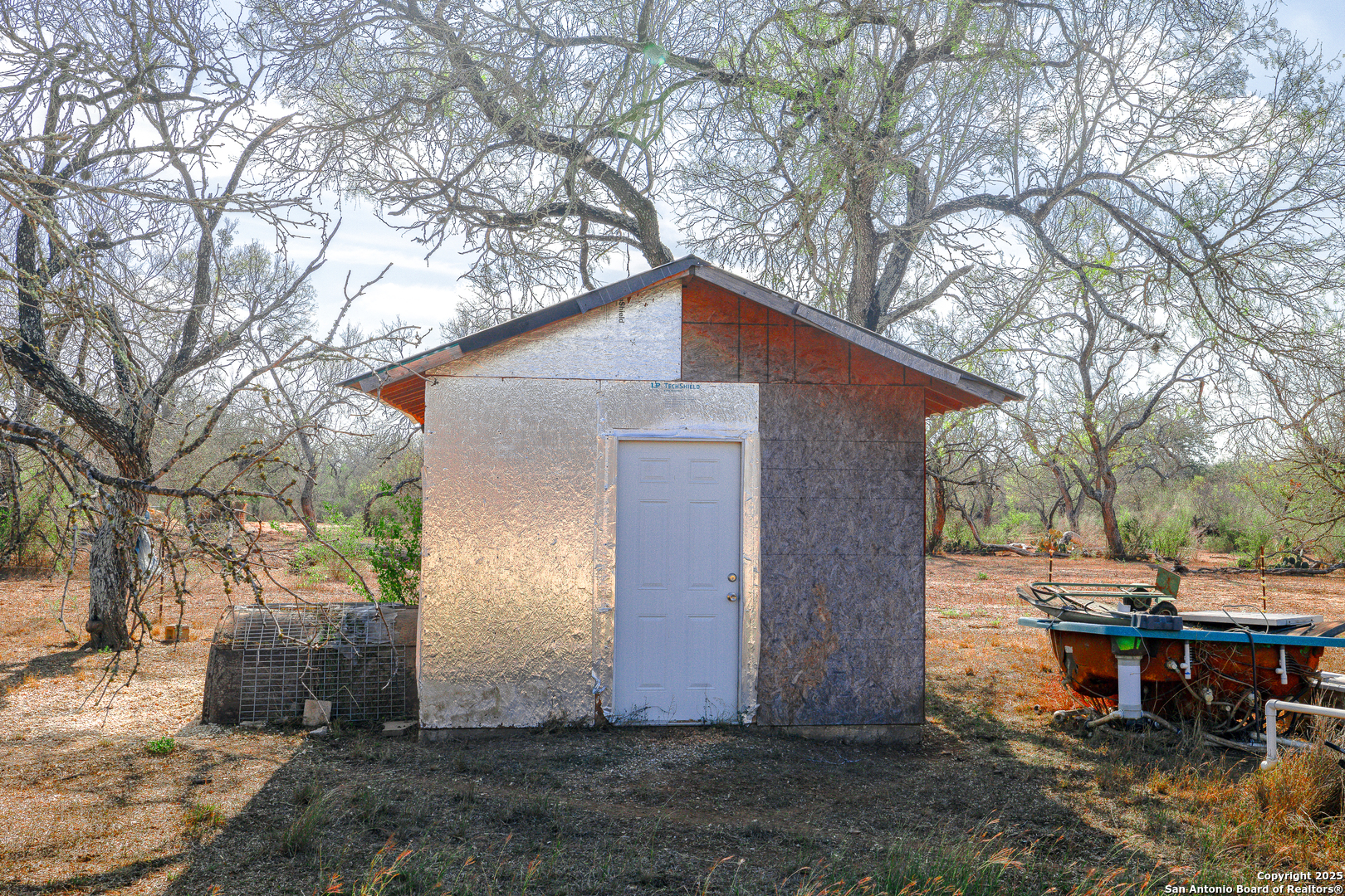 Tbd Old Pleasanton Road Poteet, TX 78264 - Photo 13 of 24 a backyard of a house with table and chairs