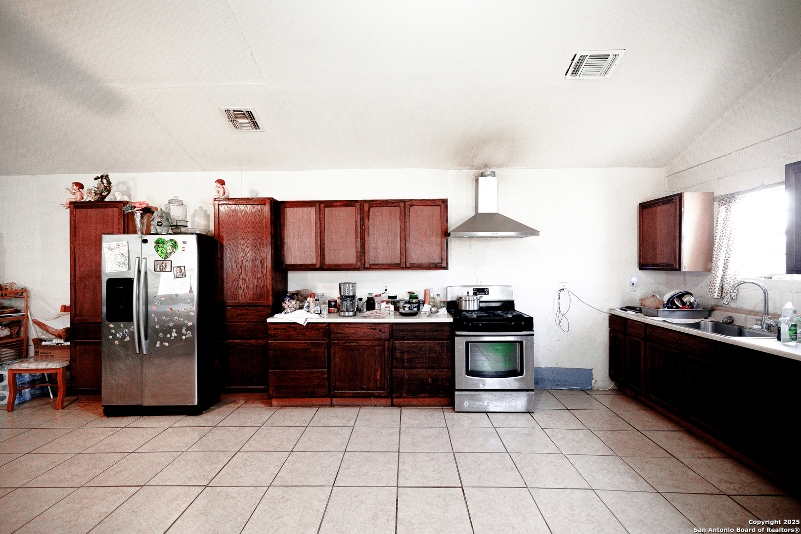 Tbd Old Pleasanton Road Poteet, TX 78264 - Photo 15 of 24 a kitchen with stainless steel appliances and a refrigerator