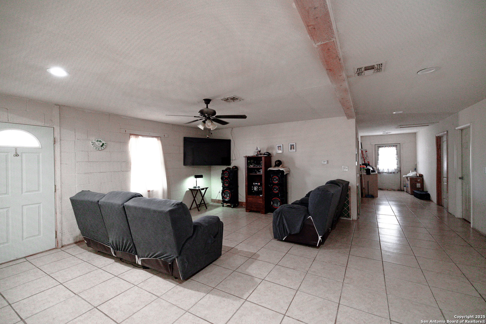 Tbd Old Pleasanton Road Poteet, TX 78264 - Photo 16 of 24 a living room with furniture and a chandelier