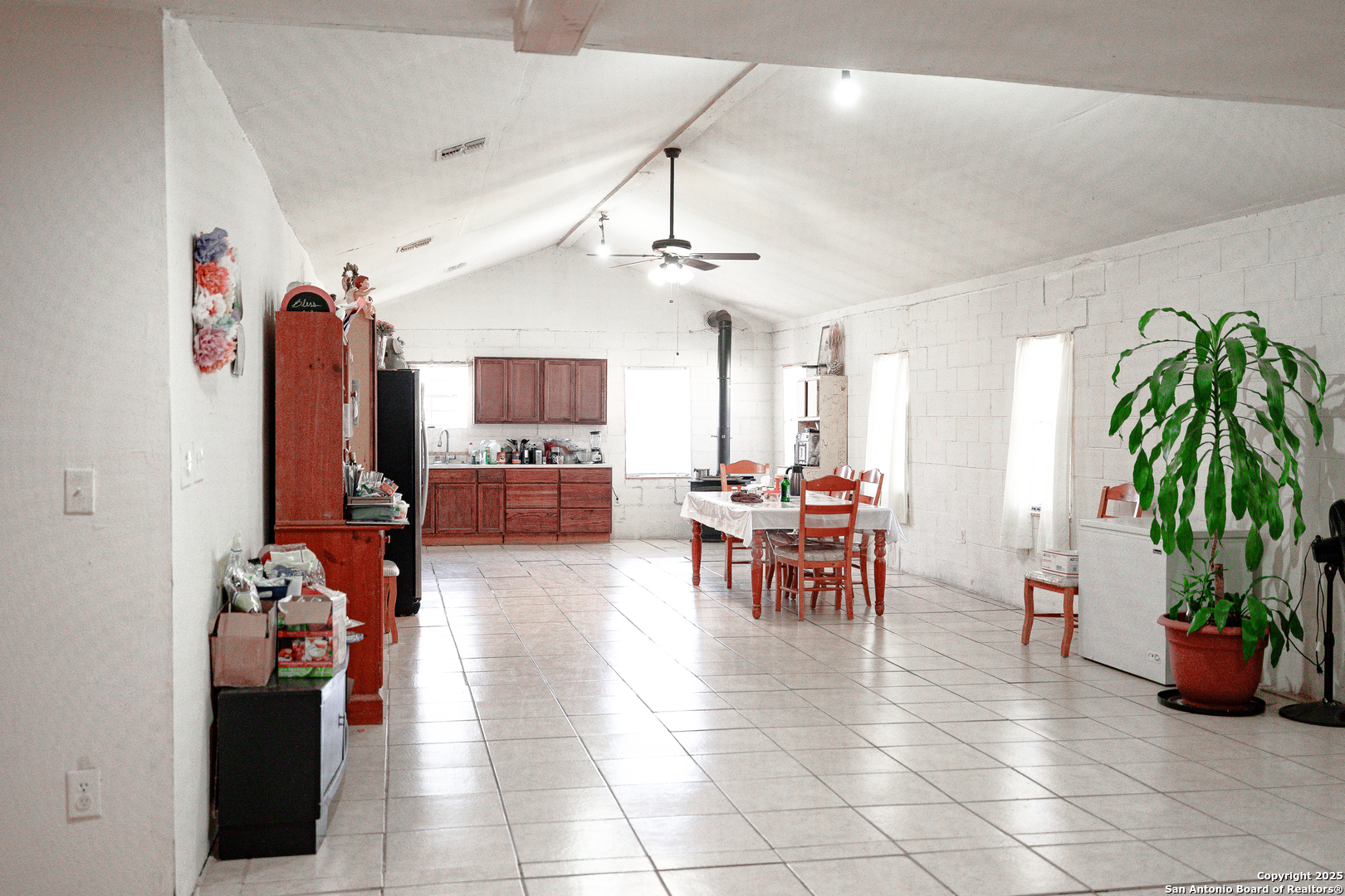 Tbd Old Pleasanton Road Poteet, TX 78264 - Photo 17 of 24 a view of a livingroom with furniture and a potted plant