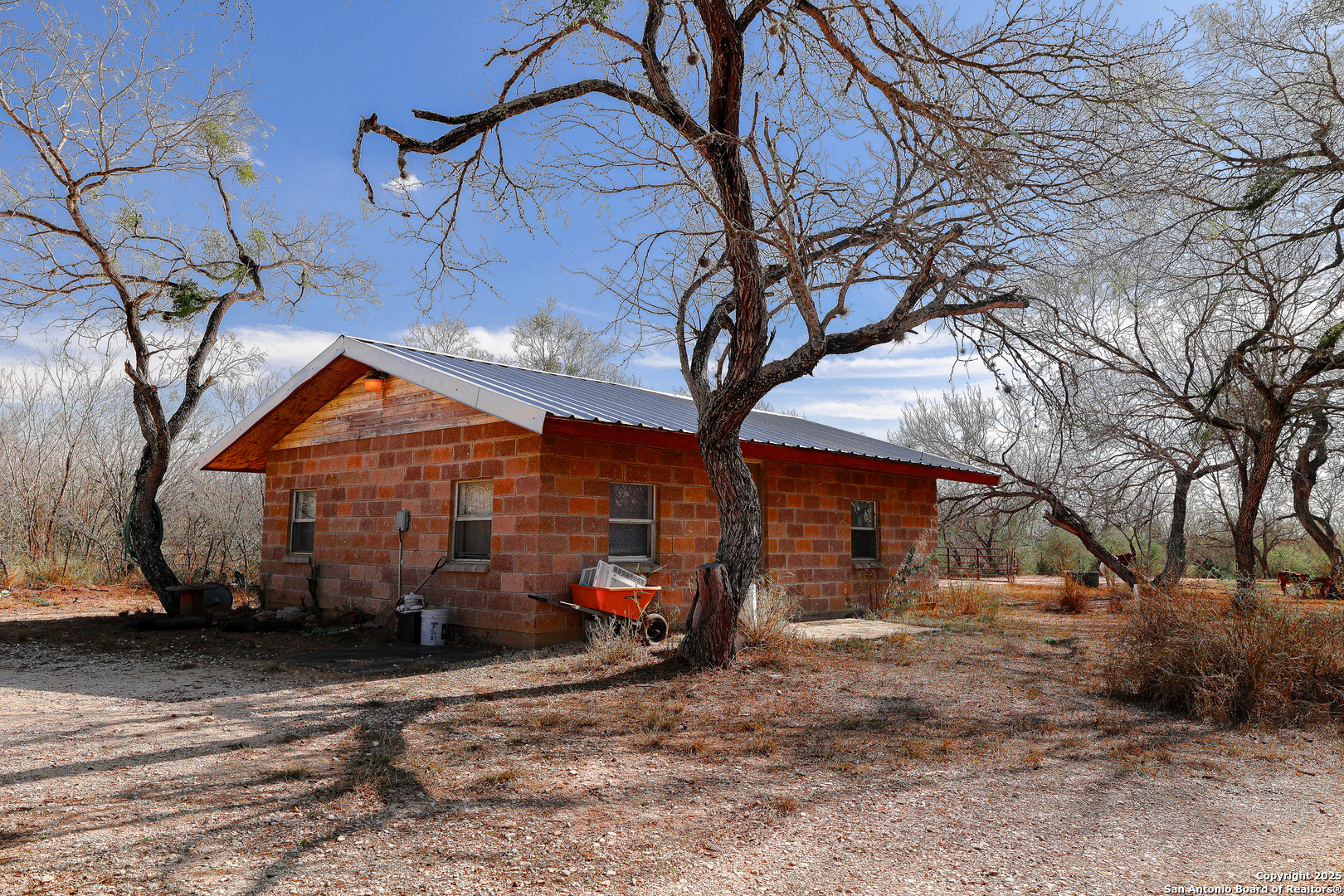 Tbd Old Pleasanton Road Poteet, TX 78264 - Photo 22 of 24 a view of a house with large trees
