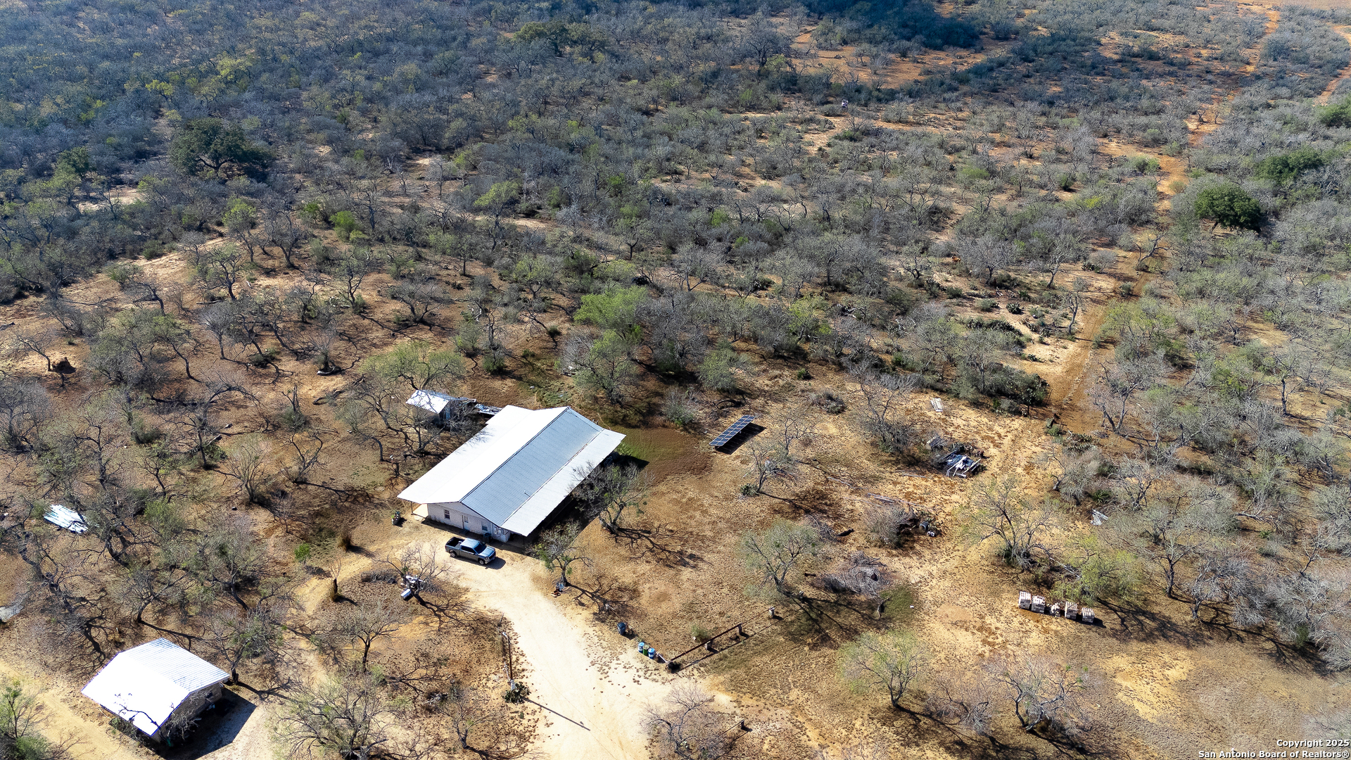 Tbd Old Pleasanton Road Poteet, TX 78264 - Photo 7 of 24 a view of a dry yard with a tree