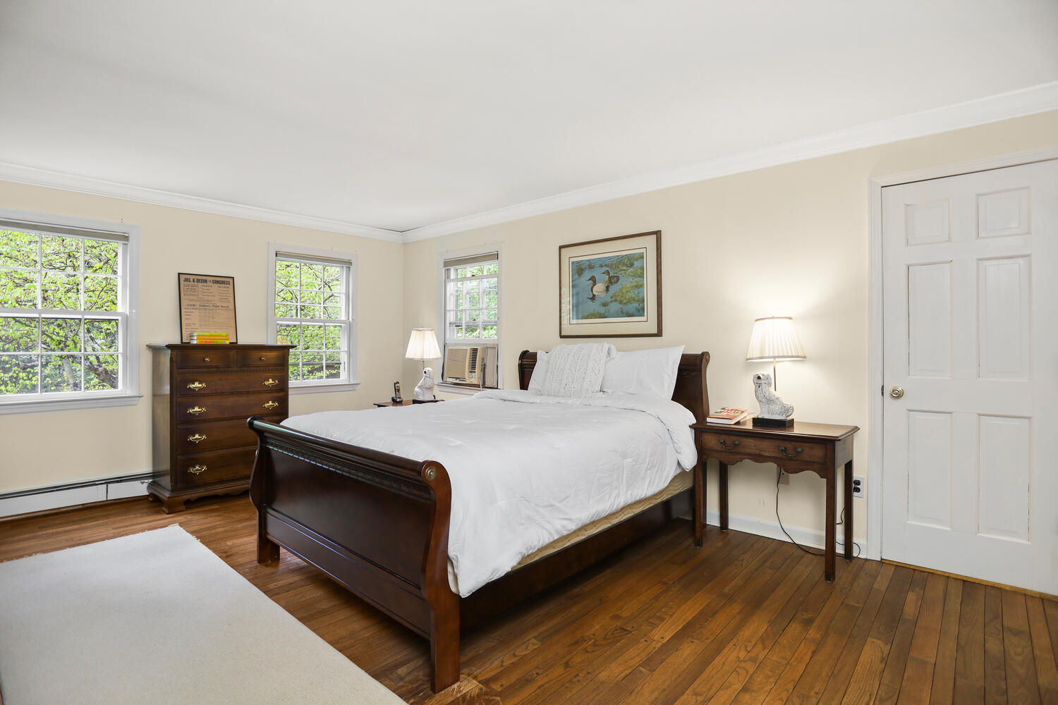 781 Valley Road New Canaan, CT 06840 - Photo 16 of 29 a bed room with a bed and a window