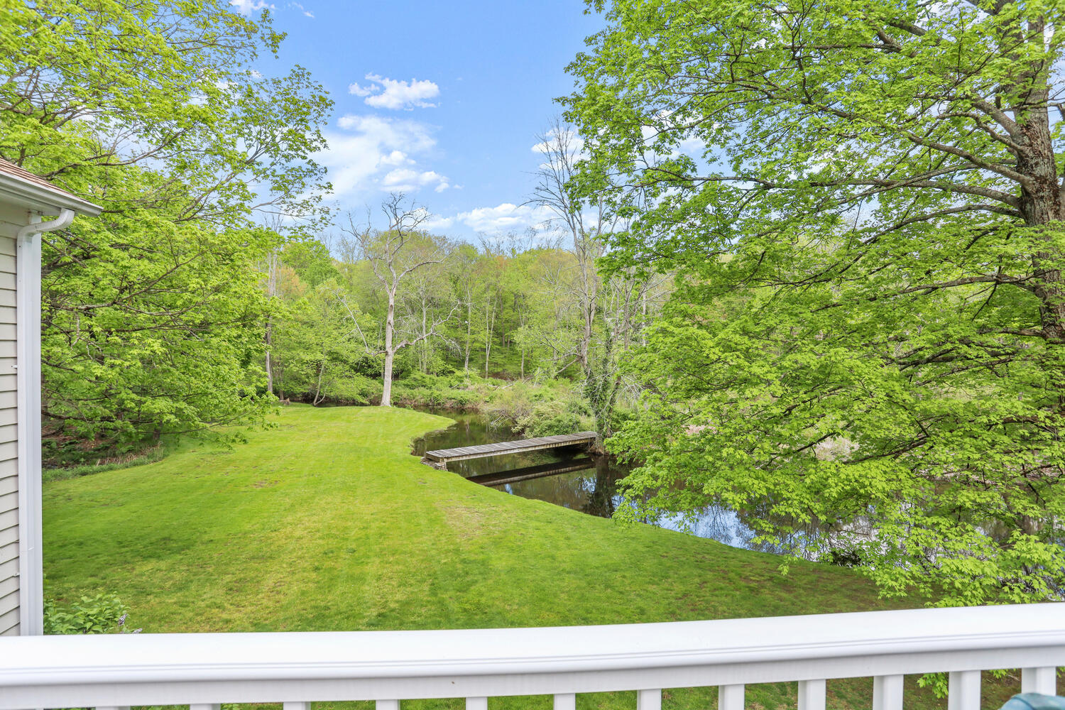781 Valley Road New Canaan, CT 06840 - Photo 17 of 29 a view of backyard with green space