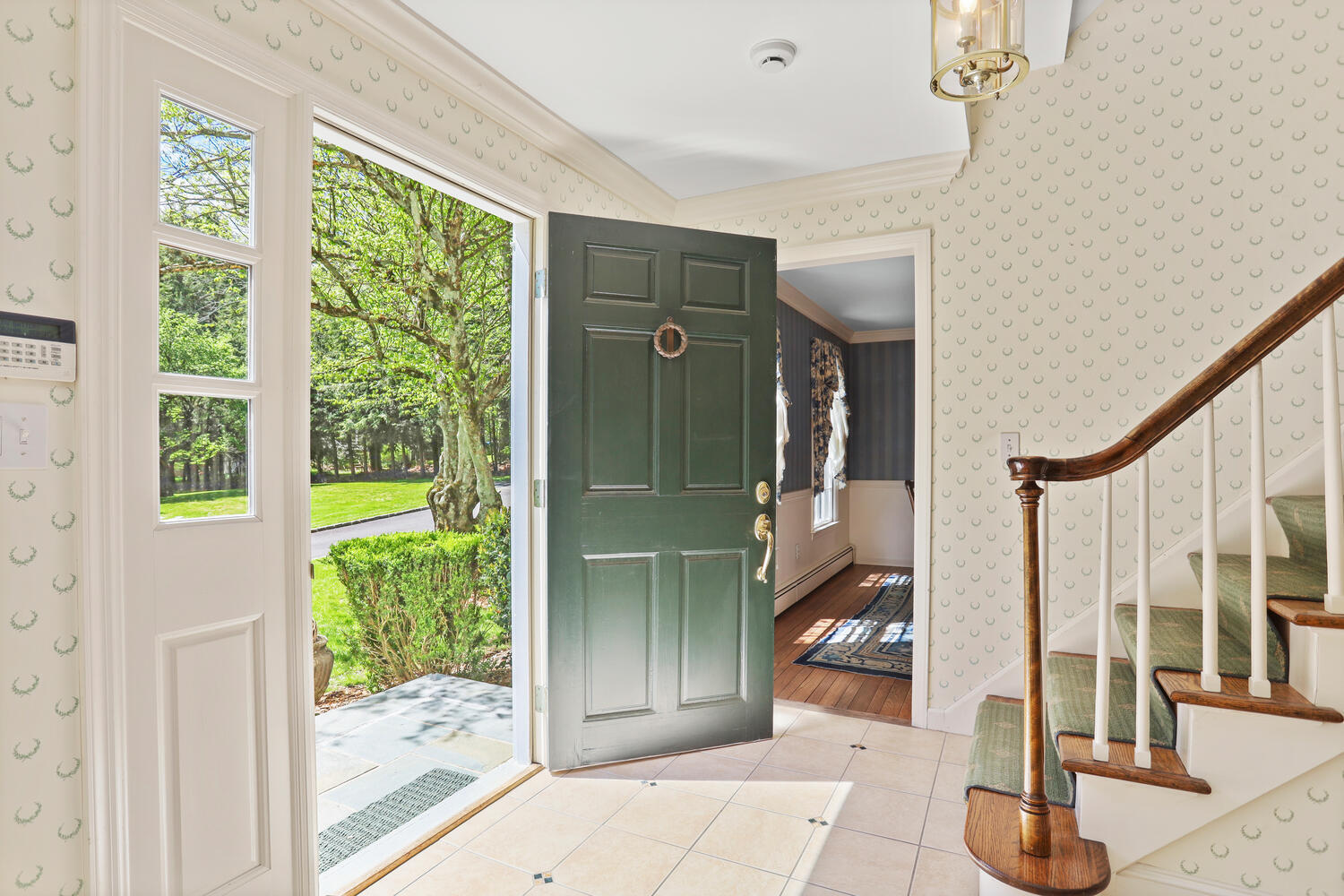 781 Valley Road New Canaan, CT 06840 - Photo 3 of 29 a view of entryway livingroom and hall with wooden floor