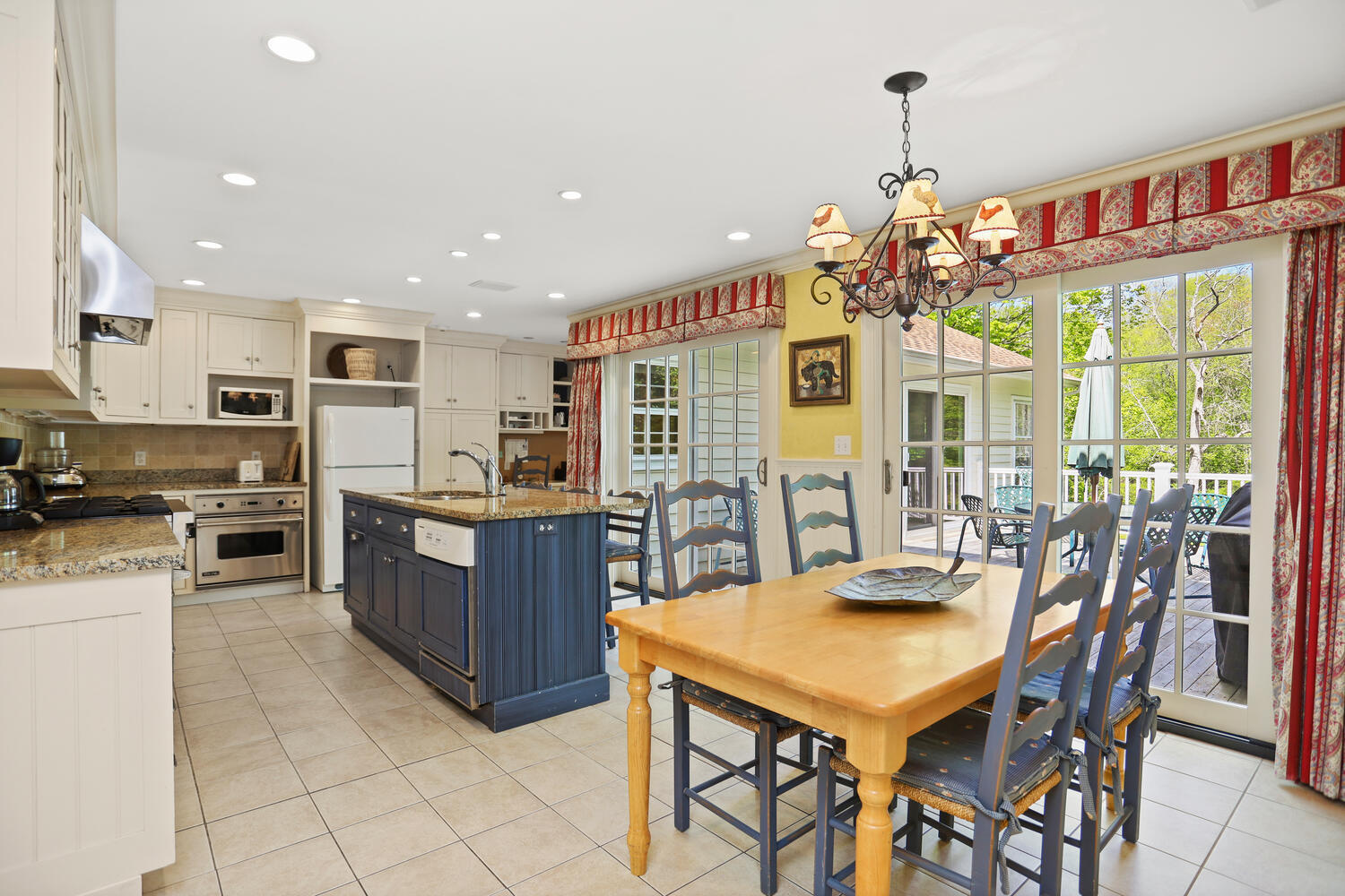 781 Valley Road New Canaan, CT 06840 - Photo 6 of 29 a view of a dining room with furniture window and outside view
