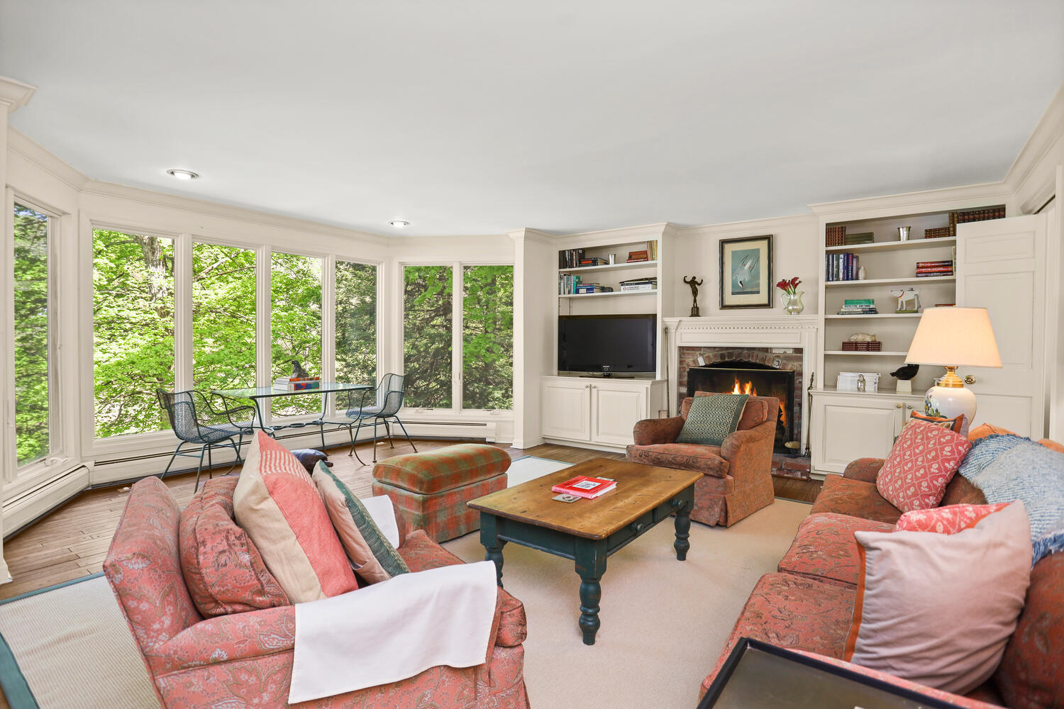 781 Valley Road New Canaan, CT 06840 - Photo 9 of 29 a living room with furniture and a flat screen tv