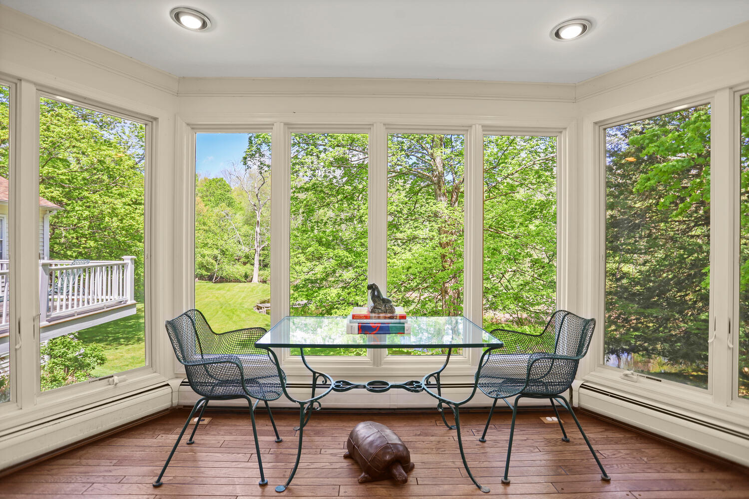 781 Valley Road New Canaan, CT 06840 - Photo 10 of 29 a dining room with furniture and wooden floor