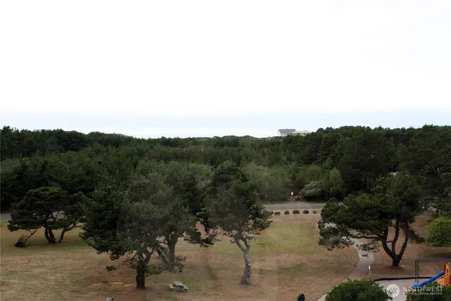 an aerial view of residential house and outdoor space