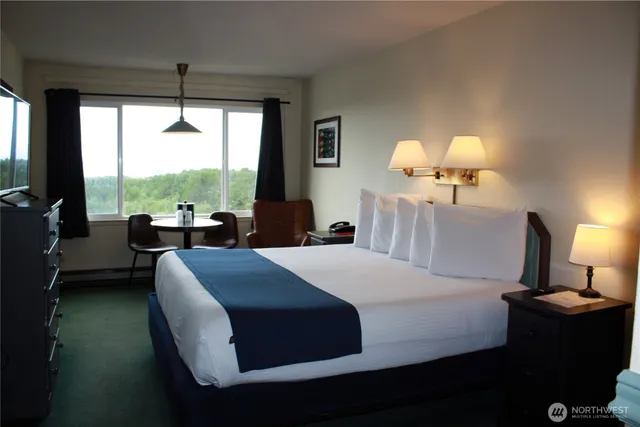 a view of a bathroom from a hallway