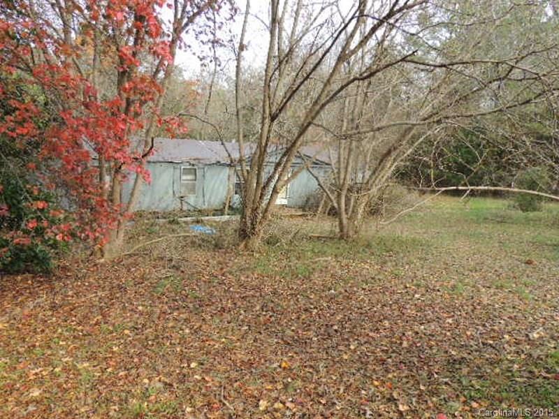 150 Alvin Hough Road Midland, NC 28107 - Photo 2 of 5 a view of a backyard with large trees